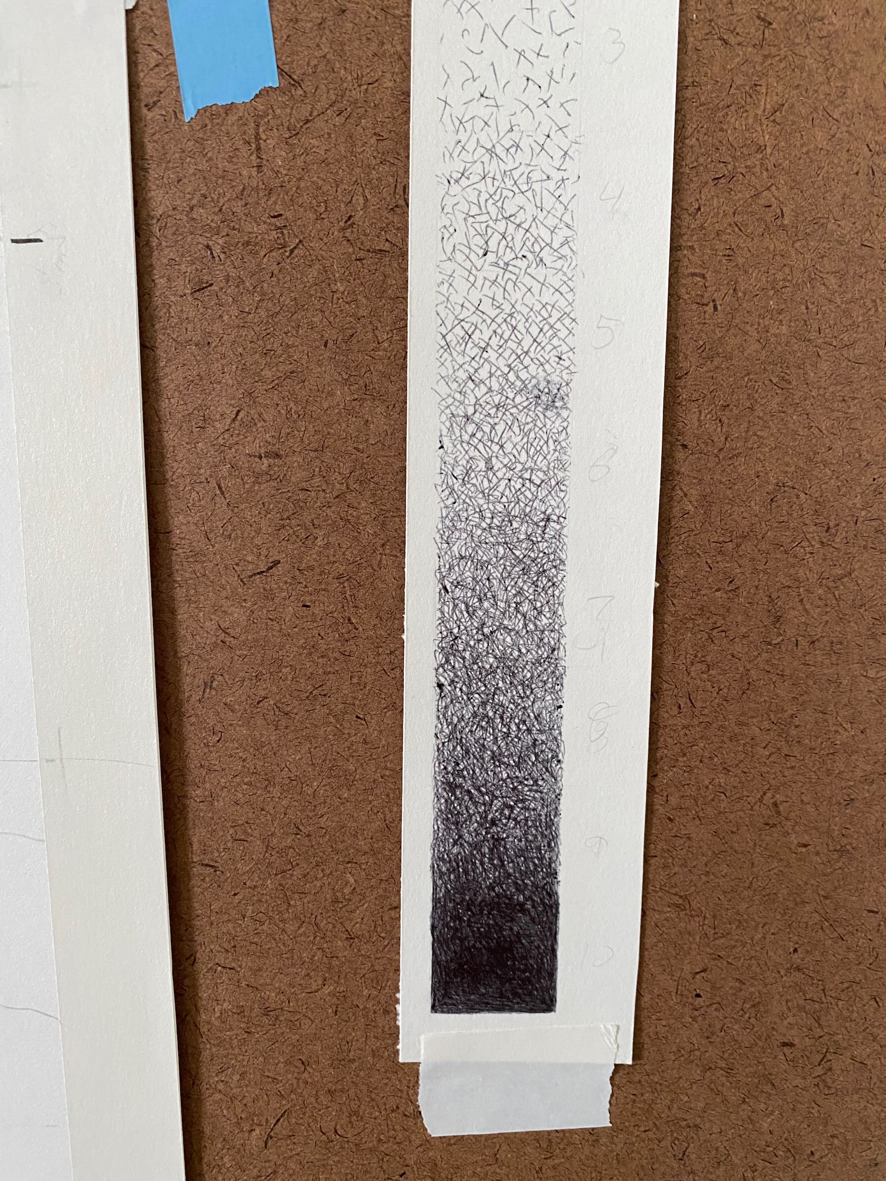 A greyscale strip that I made and taped next to my work station.